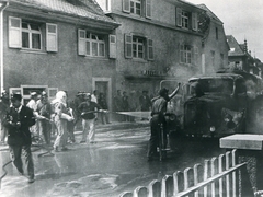 Brand eines Tanklasters mit Heizöl 1965/66" caption="Metzgerei Willis gegenüber heutiger Volksbank